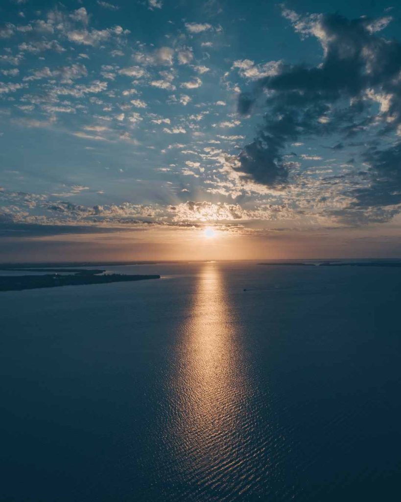 Sunrise over water. Therapy in Beaverton, OR can help you find peace.